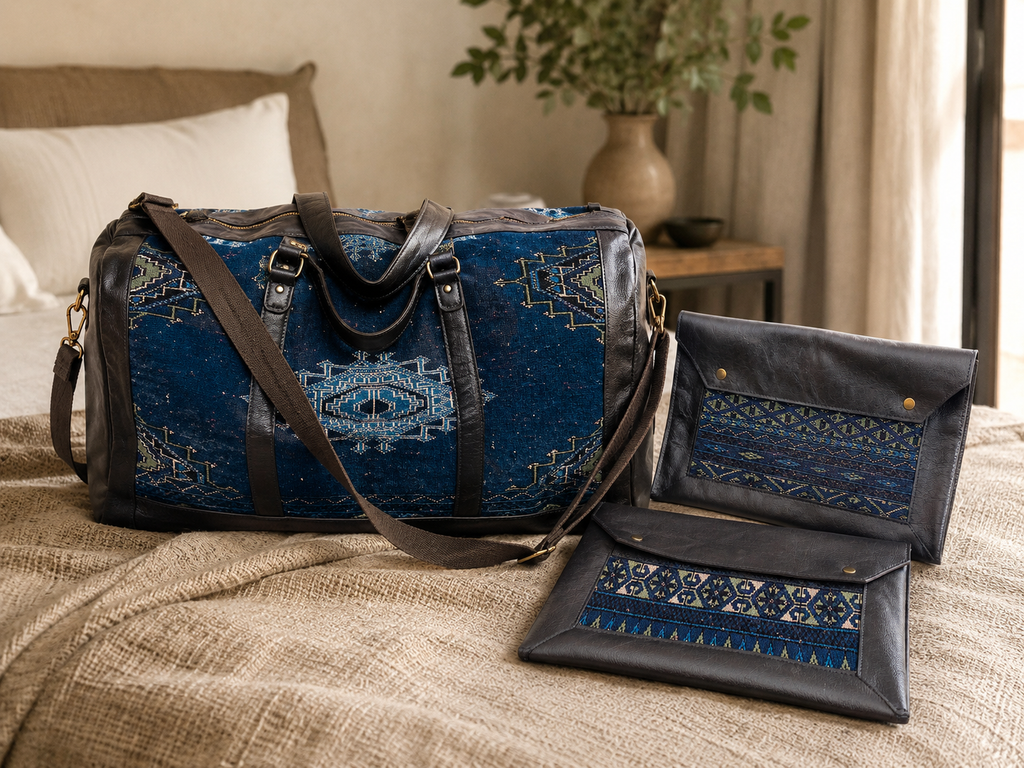 Handmade Duffle Bag and Laptop Cases with upcycled leather and textile panels by Rosanna Gethin