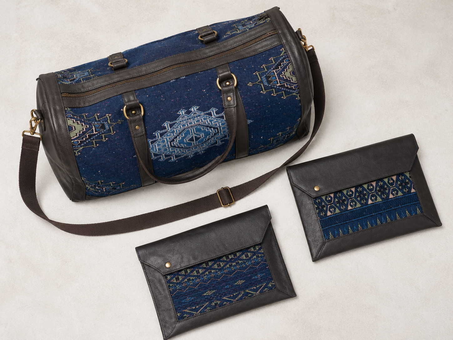 Handmade Duffle Bag and Laptop Cases with upcycled leather and textile panels by Rosanna Gethin