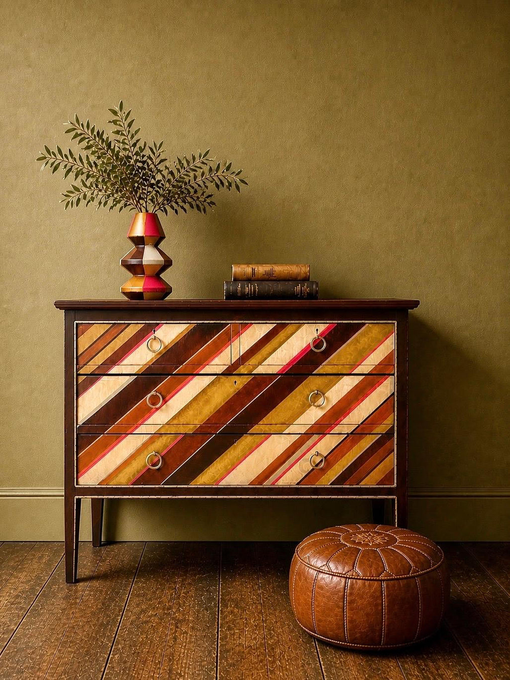 vintage chest of drawers with an asymmetrical painted design by Sarah Parmenter