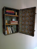 Vintage suitcase storage by Medina Grillo